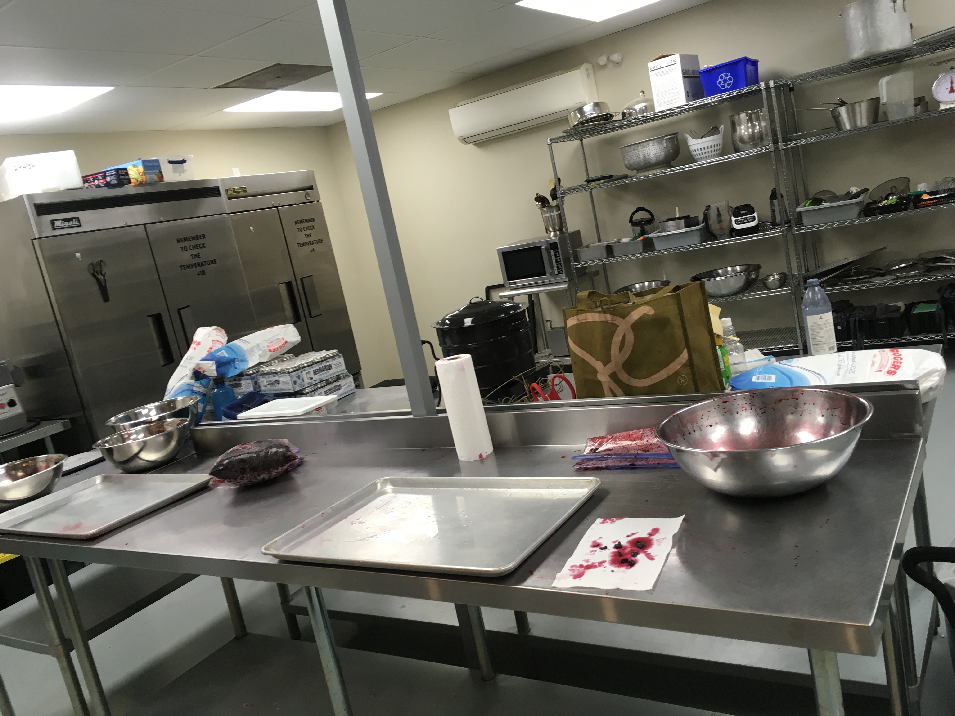 At Zest Commercial Food Hub processing haskap berries into jam